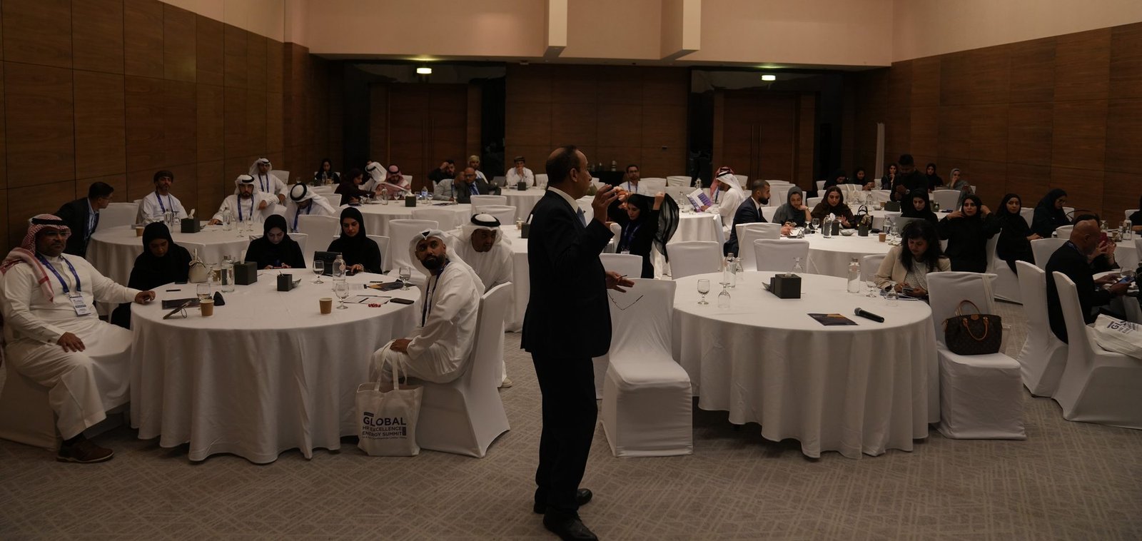 Mostafa Azzam working the ballroom at the Global HR Excellence Energy Summit 2026