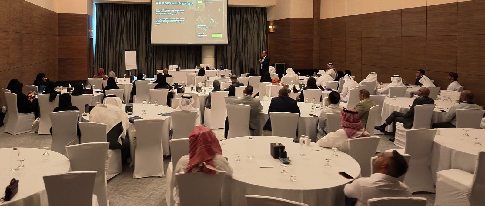 A full ballroom of delegates during a TALENT executive workshop
