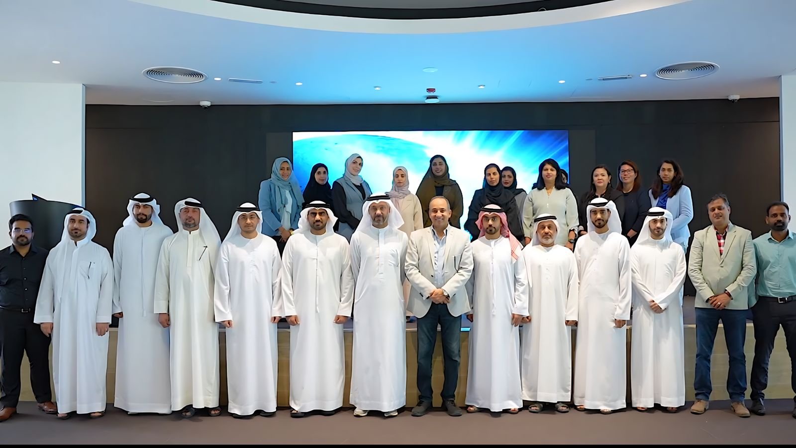 Program cohort: Closing photo with a GCC cohort