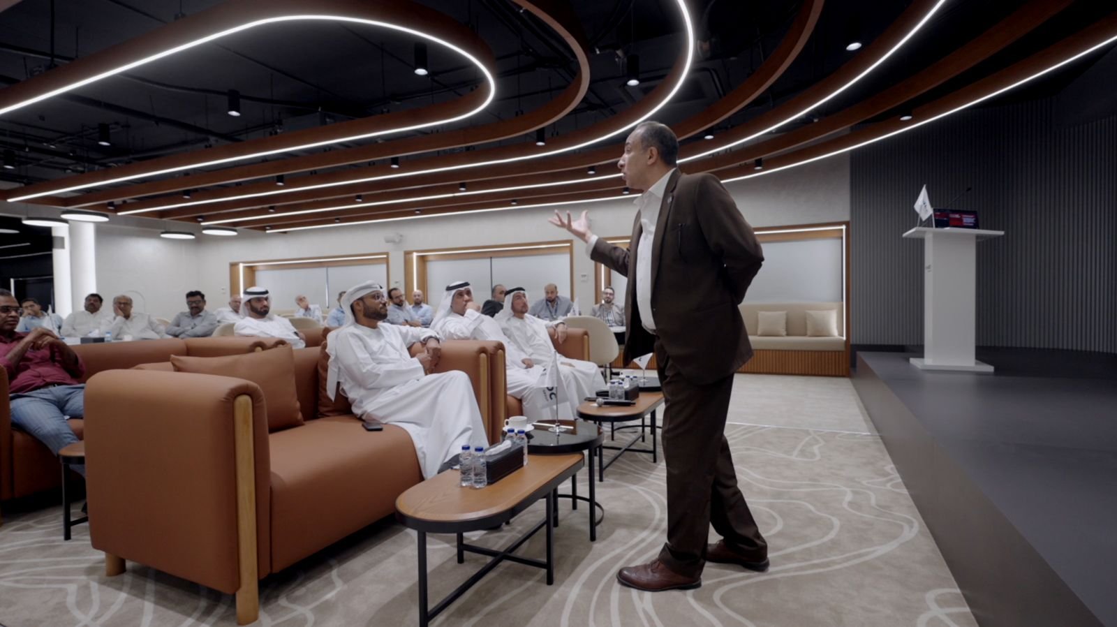 Mostafa Azzam facilitating an AI session with senior leaders