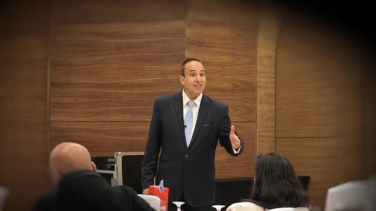 Mostafa Azzam presenting to a full ballroom at the Global HR Excellence Energy Summit, September 2026